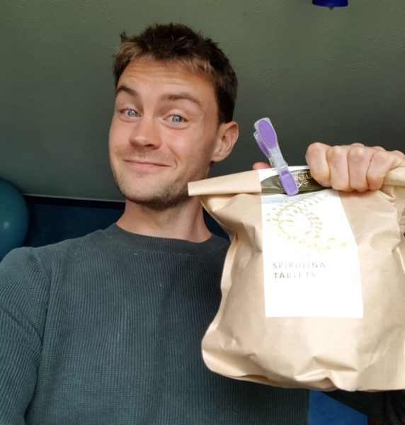 A Life Coach holding Spirulina